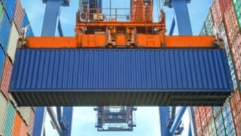 Incoterms Cargo container hoisted midair by crane