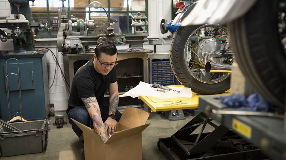 Man unpacking a box Man unpacking a box