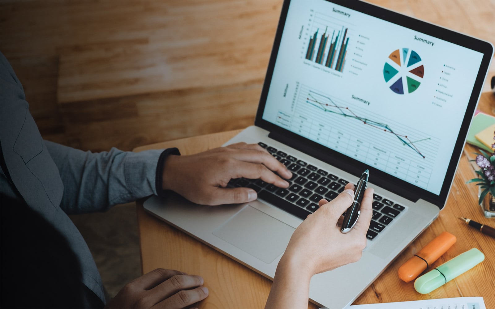 A man looking at a slide deck with results