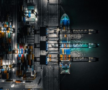 Fall 2022 Supply Chain Virtual Connect ocean freight container at night