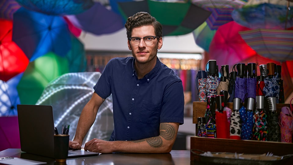 Unstoppable man with umbrellas Unstoppable man with umbrellas