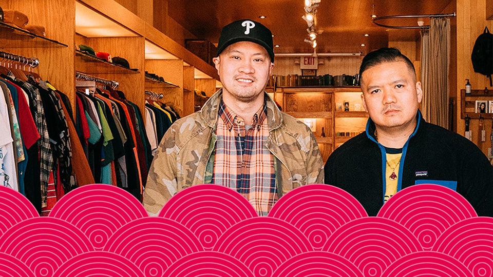 Two men in a retail store. Two men in a retail store.